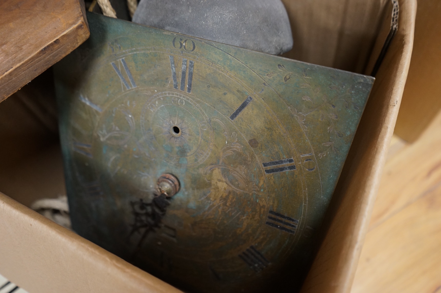 A brass dial wall clock, birdcage movement, 30cm square, unknown if working